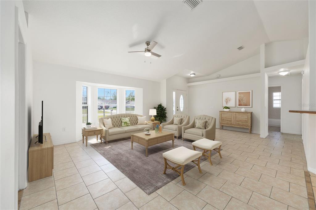15434 Southwest 23rd Court Road Ocala, FL 34473 - Photo 10 of 41 a living room with furniture and a table