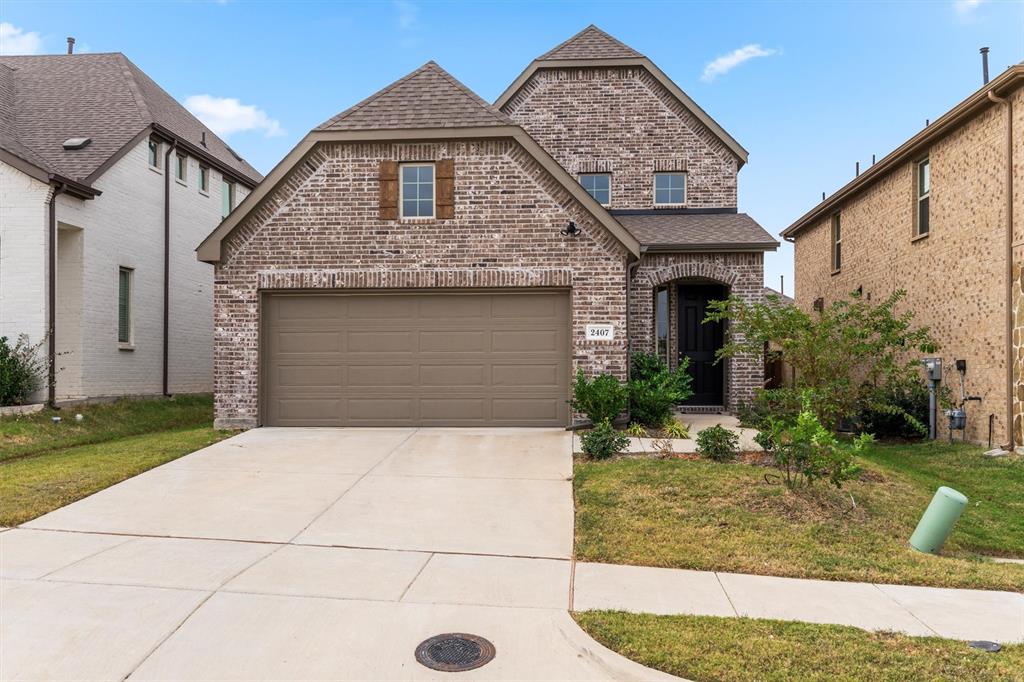 2407 Neff Lane Forney, TX 75126 - Photo 1 of 22 a front view of a house with garden
