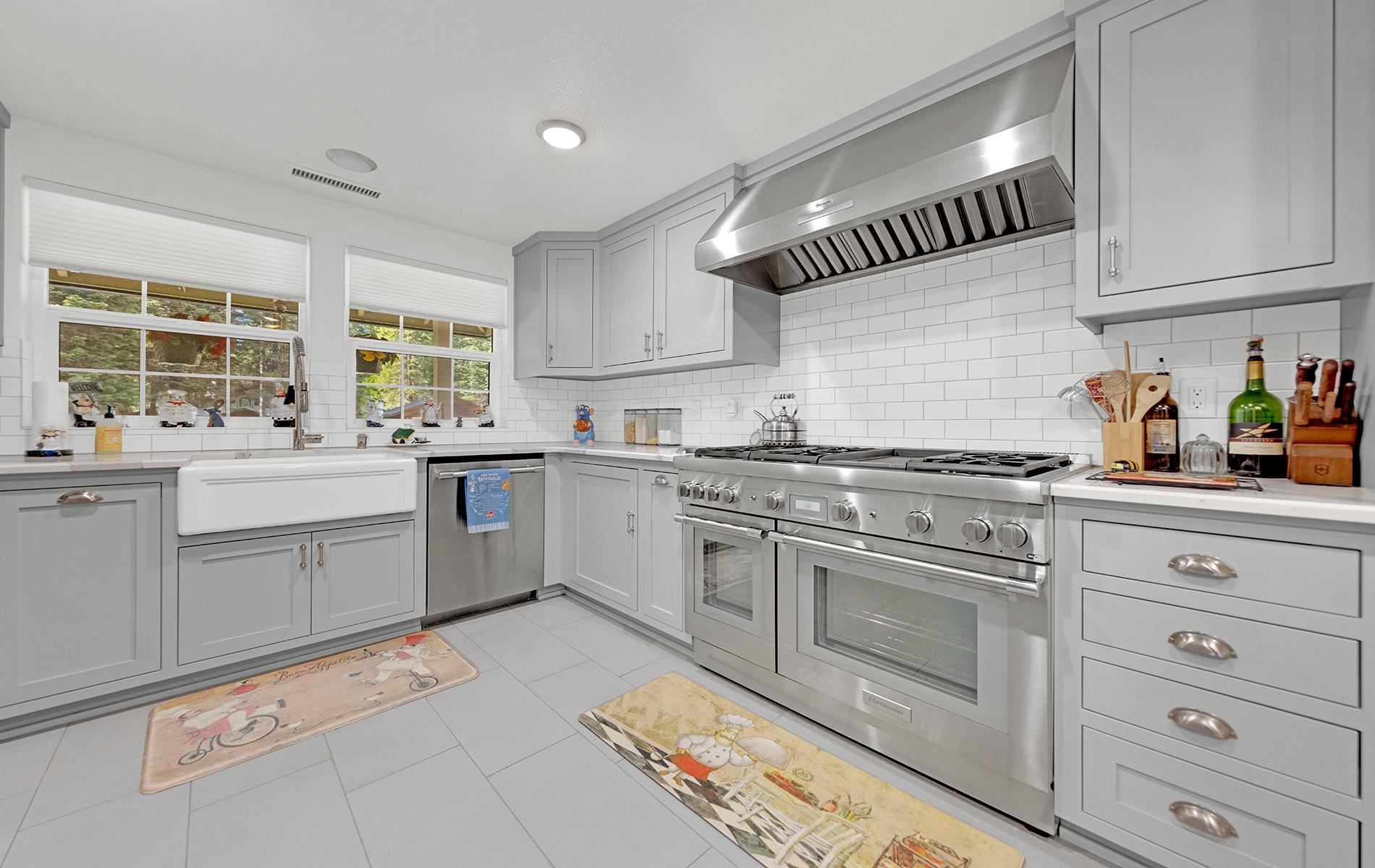 650 Wagon Road Chester, CA 96020 - Photo 9 of 36 a kitchen with granite countertop a sink stainless steel appliances and cabinets