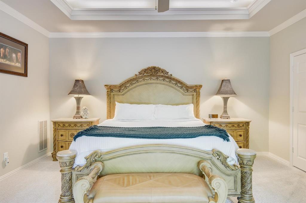 2740 High Road Flower Mound, TX 75022 - Photo 14 of 35 a bedroom with a bed and a table