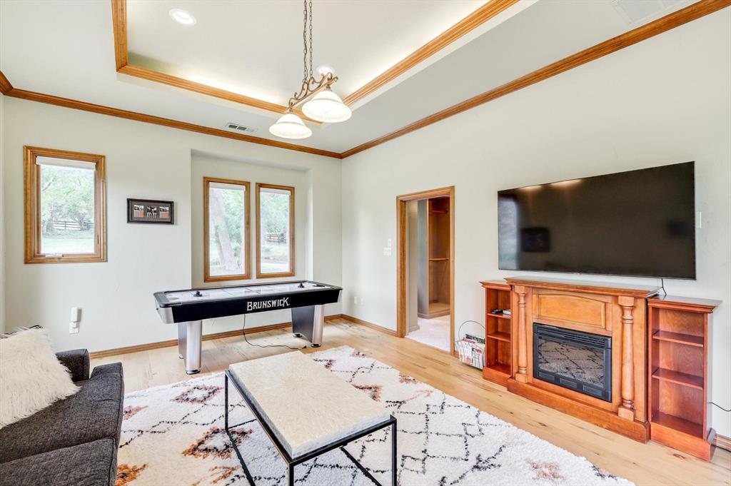 2740 High Road Flower Mound, TX 75022 - Photo 21 of 35 a living room with furniture and a flat screen tv