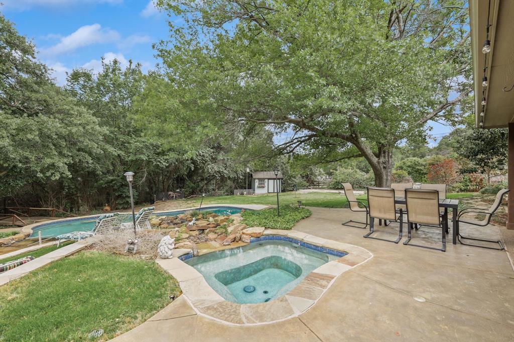 2740 High Road Flower Mound, TX 75022 - Photo 28 of 35 a view of a garden with a slide