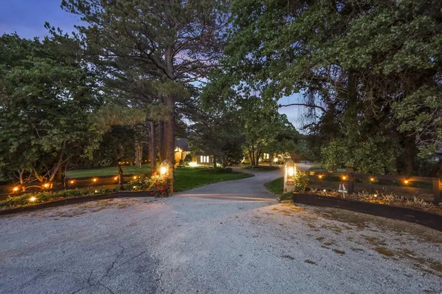 a view of a street with some trees