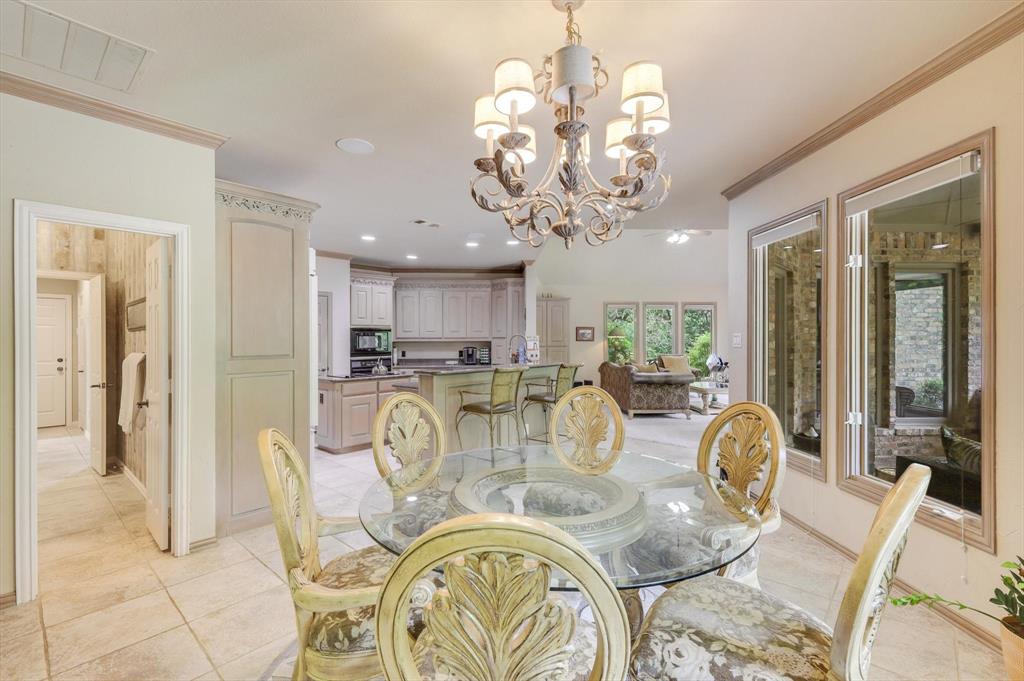 2740 High Road Flower Mound, TX 75022 - Photo 9 of 35 a view of a dining room with furniture