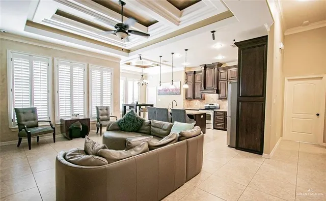 a kitchen with cabinets and stainless steel appliances