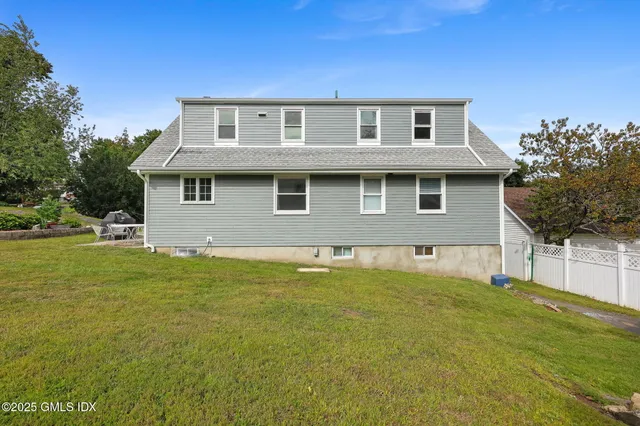 a picture of a bench in a white building
