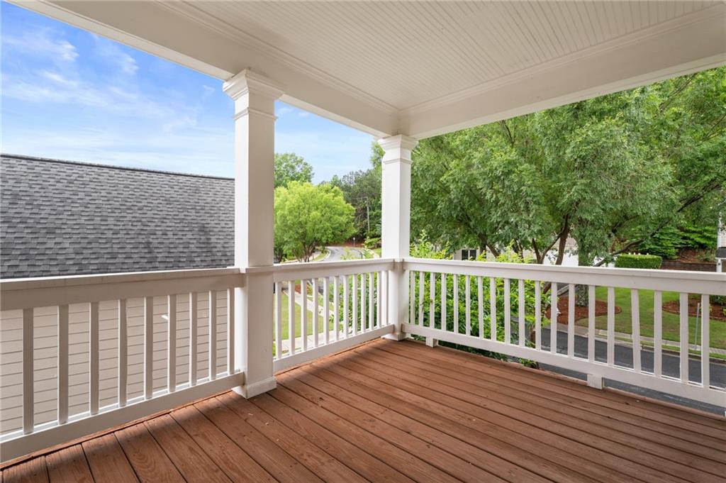 878 Scales Road Suwanee, GA 30024 - Photo 11 of 17 a view of balcony with wooden floor