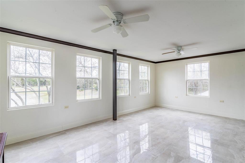 16301 Highway 121 Blue Ridge, TX 75424 - Photo 12 of 27 a view of an empty room with a window