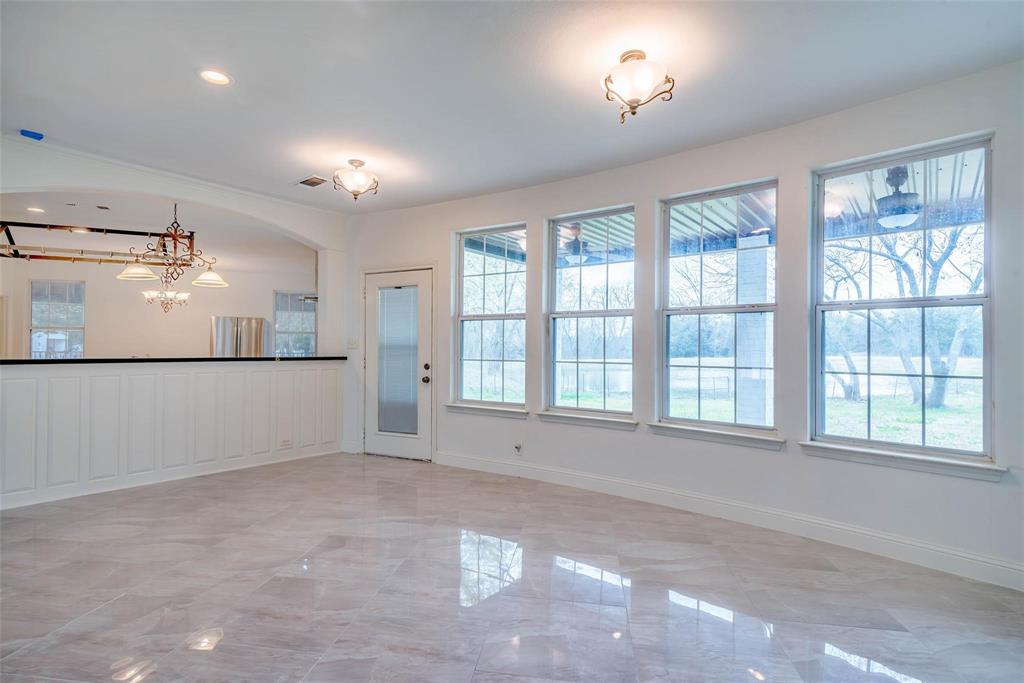 16301 Highway 121 Blue Ridge, TX 75424 - Photo 5 of 27 a view of an empty room with a window
