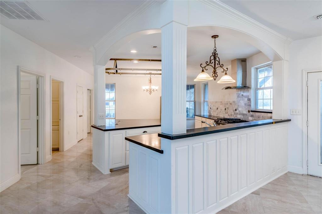 16301 Highway 121 Blue Ridge, TX 75424 - Photo 6 of 27 a kitchen with stainless steel appliances a refrigerator and cabinets