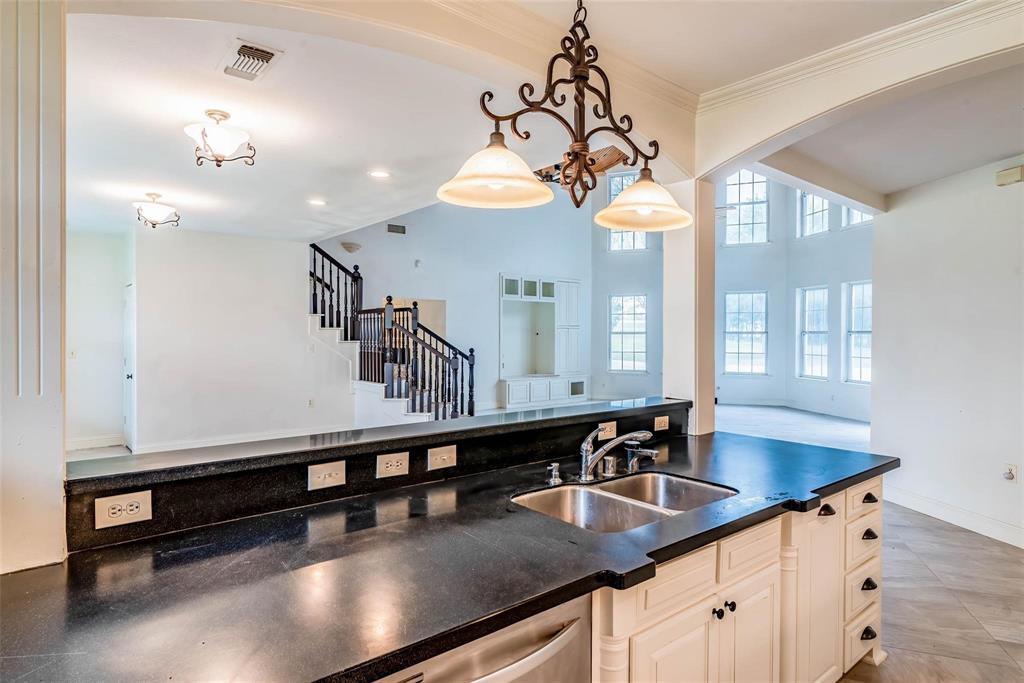16301 Highway 121 Blue Ridge, TX 75424 - Photo 10 of 27 a kitchen with kitchen island a sink appliances and a counter top space