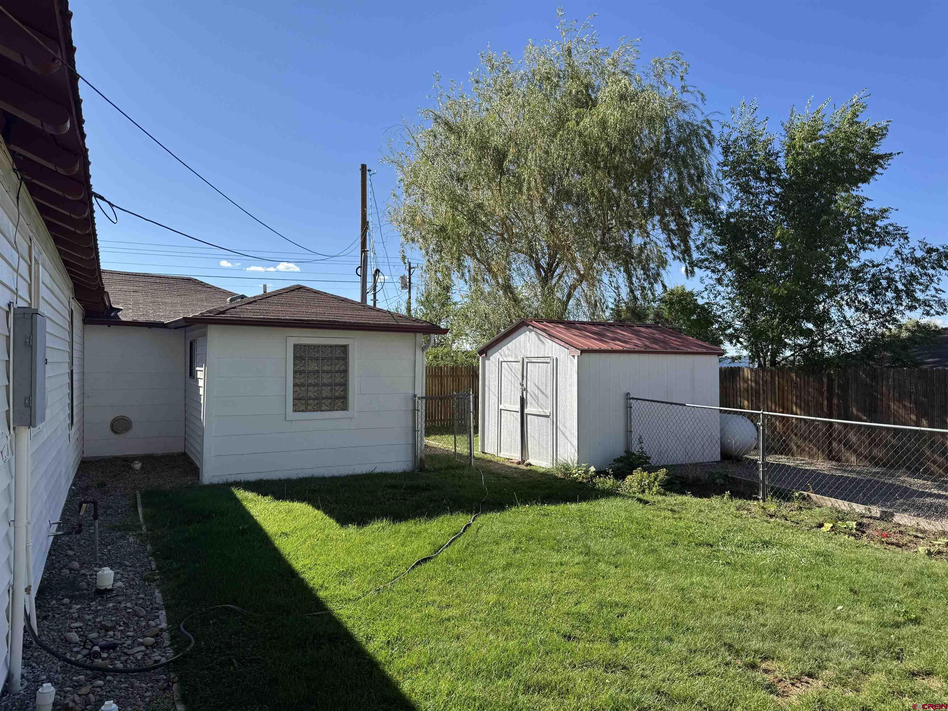 210 West Coronado Avenue Cortez, CO 81321 - Photo 23 of 41 a house view with a garden space