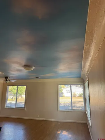 an empty room with windows