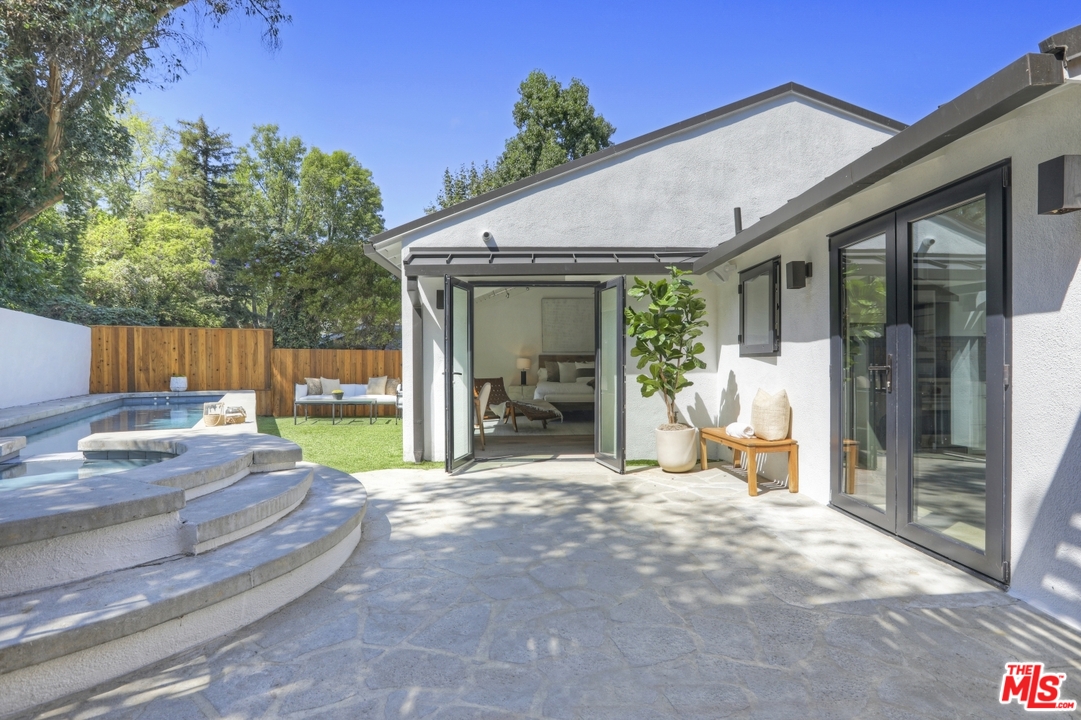 2425 Rinconia Drive Los Angeles, CA 90068 - Photo 22 of 32 a view of a house with backyard and sitting area