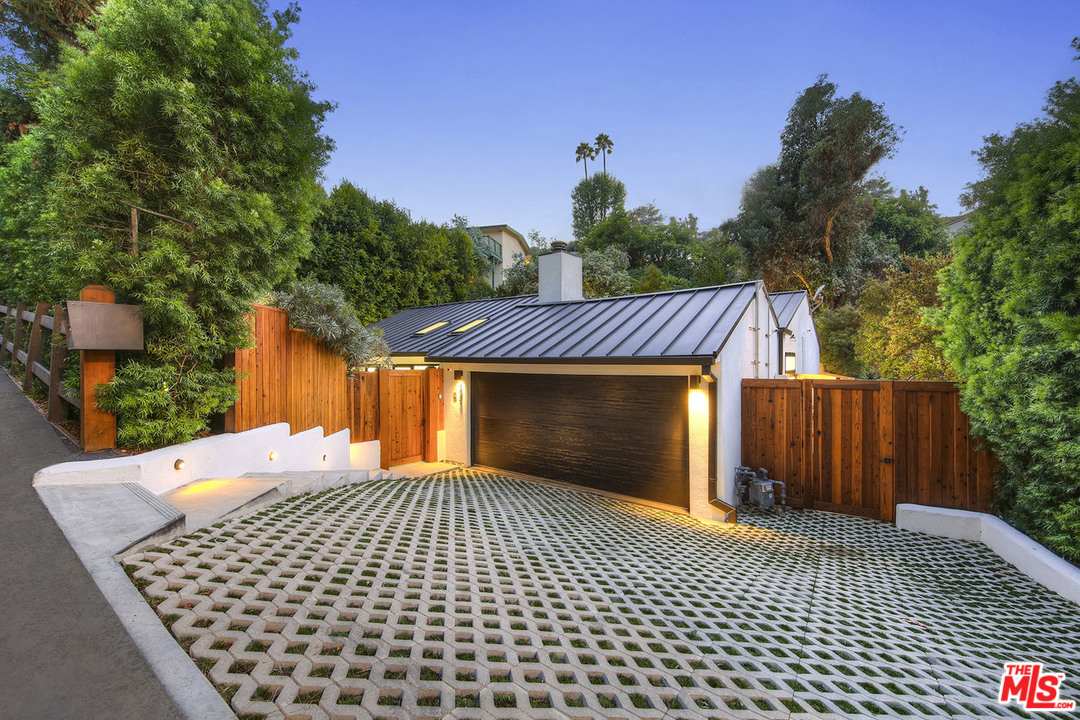 2425 Rinconia Drive Los Angeles, CA 90068 - Photo 26 of 32 a view of backyard with a garden and trees
