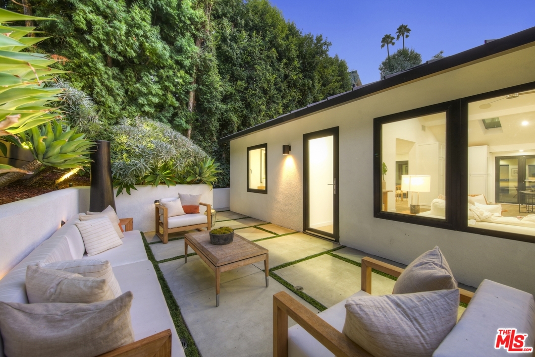 2425 Rinconia Drive Los Angeles, CA 90068 - Photo 27 of 32 a outdoor living space with furniture and a potted plant