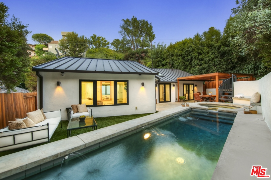 2425 Rinconia Drive Los Angeles, CA 90068 - Photo 32 of 32 a view of house with swimming pool outdoor seating