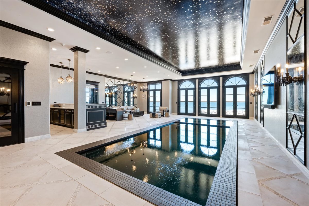 319 Sheridan Road Winnetka, IL 60093 - Photo 58 of 81 a view of a swimming pool with a balcony