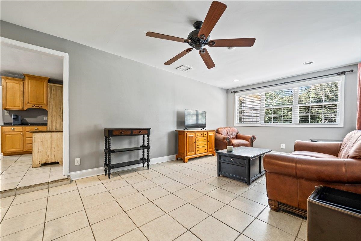 252 Barry Road Memphis, TN 38117 - Photo 21 of 39 cozy den at the back of the house, plenty of space for your comfy lounging furniture and direct access to the garage.