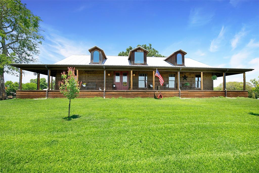 575 County Road 1214 Quitman, TX 75783 - Photo 3 of 39 a front view of a house with a yard