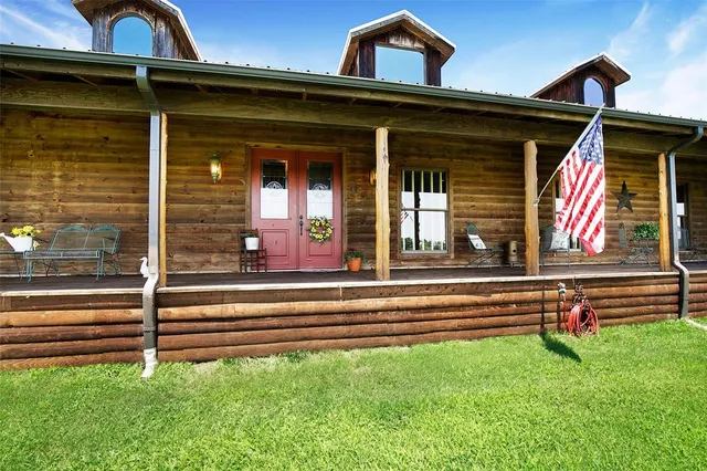 a view of a park with large trees
