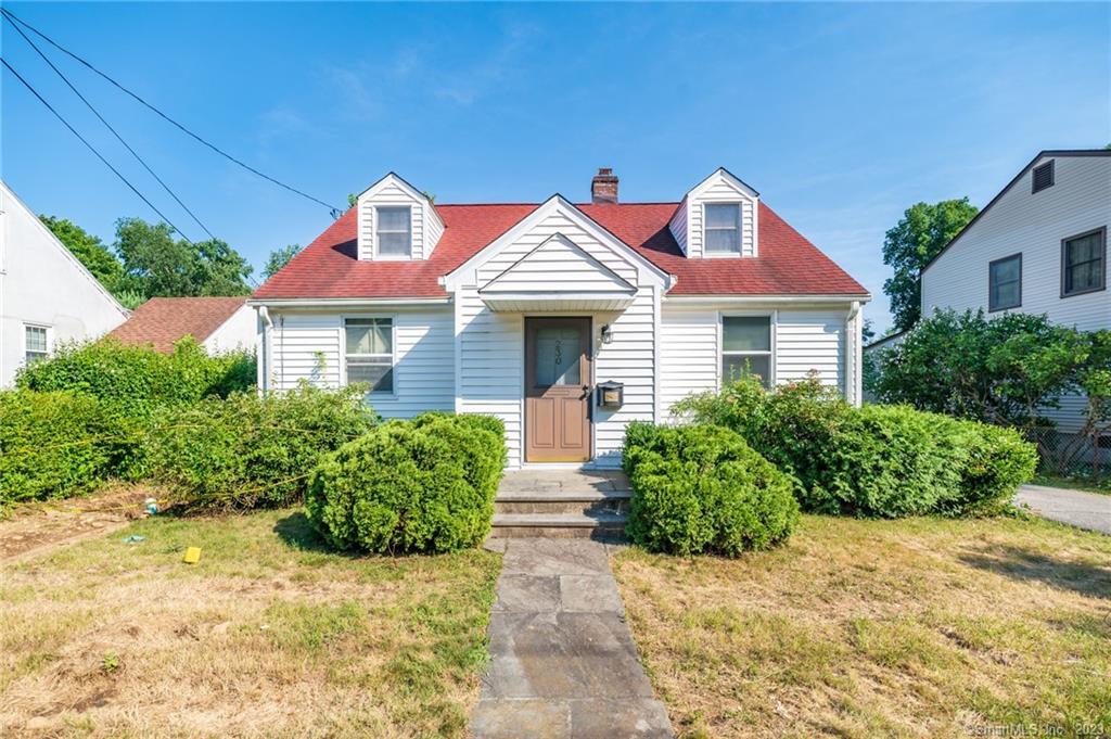 230 Cold Spring Road Stamford, CT 06905 - Photo 1 of 1 a front view of a house with garden