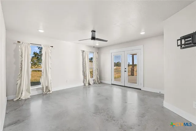 a bathroom with a sink a mirror and a shower