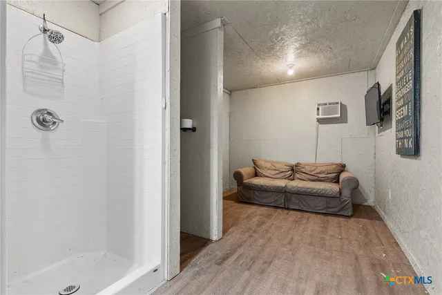 view of entryway with wooden wall