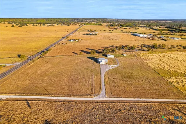 a view of a swimming pool with an ocean view