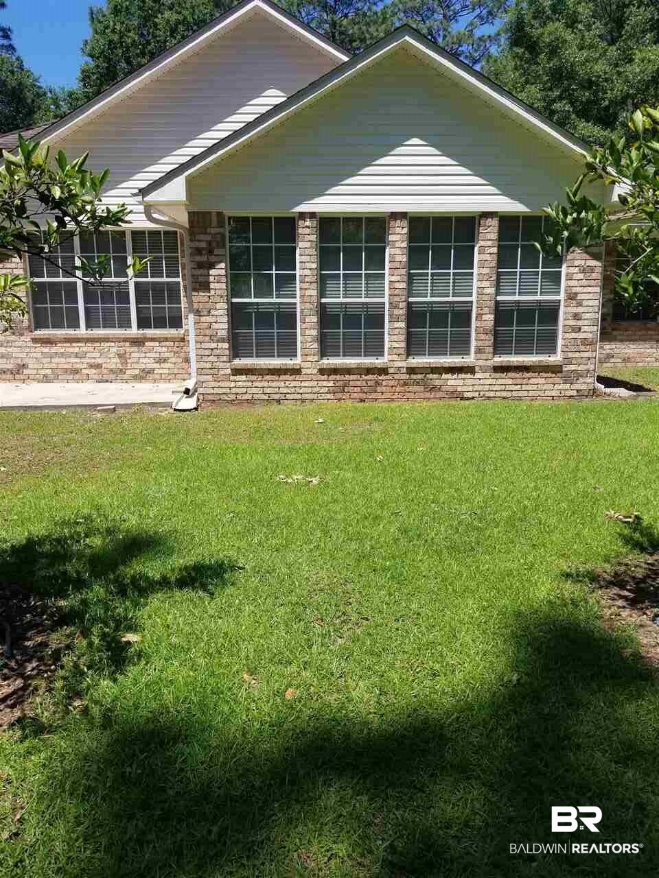 8560 Wolf Bay Lane Foley, AL 36535 - Photo 11 of 50 8ml Hurricane treatment on windows