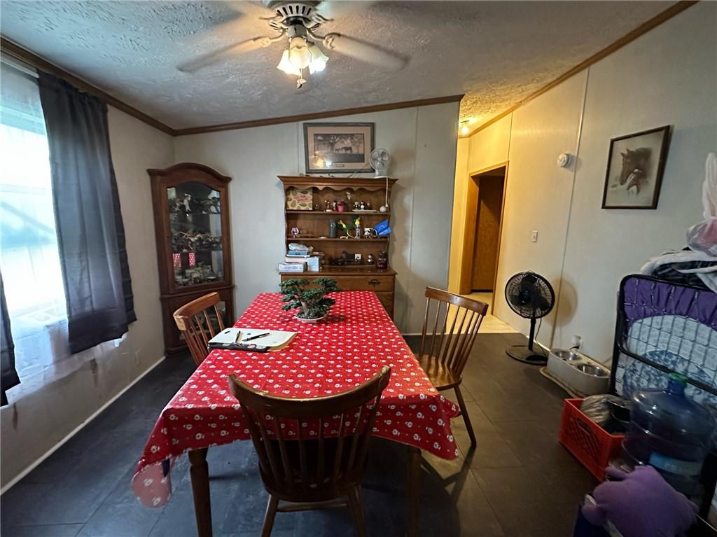 562 Palmer Adah Road Adah, PA 15410 - Photo 15 of 46 a view of a dining room with furniture and window