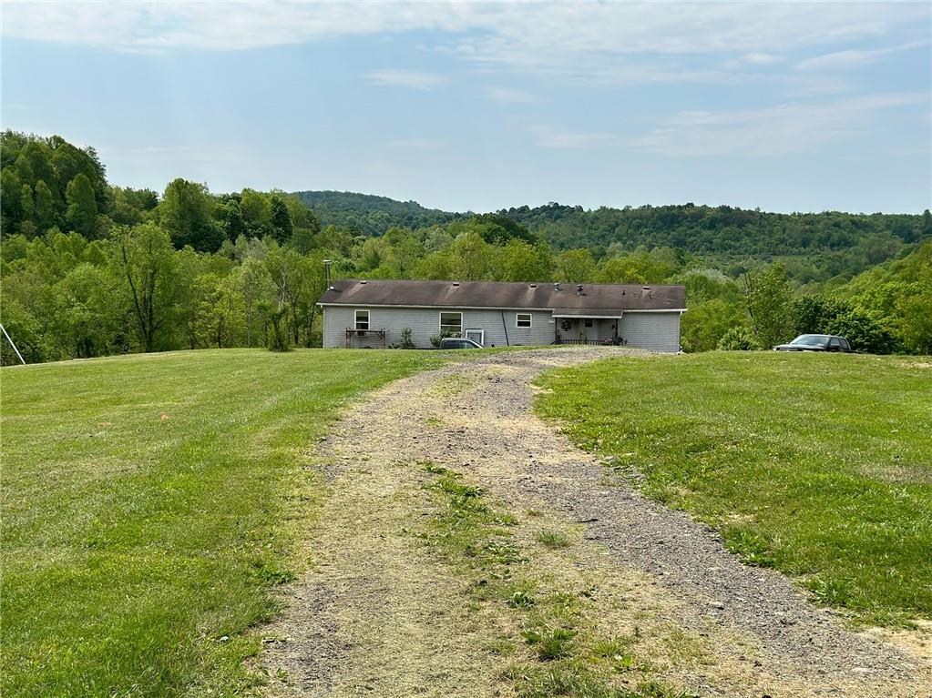 562 Palmer Adah Road Adah, PA 15410 - Photo 3 of 46 a view of a lake with houses with outdoor space