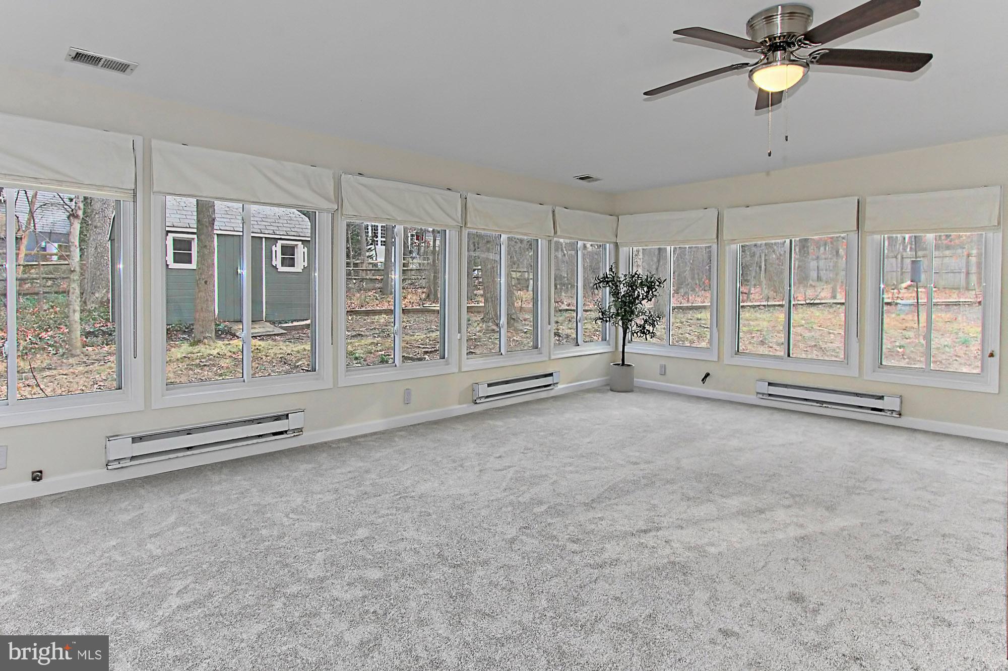 12302 Coleraine Court Reston, VA 20191 - Photo 11 of 35 Spacious Main Level Sunroom w/ Great View!