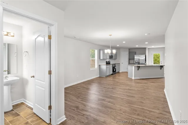 a view of kitchen with wooden floor