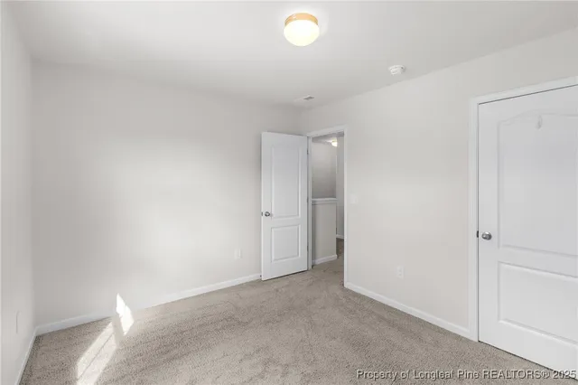 a bathroom with a sink and a window