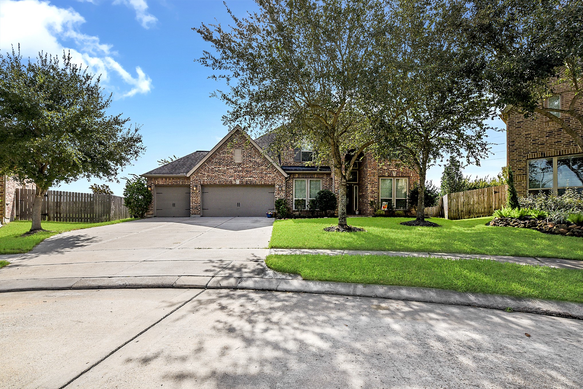2951 Bobby Jones Road Katy, TX 77494 - Photo 7 of 50 Welcome to this stunning two-story home in the sought-after master-planned community of Firethorne, known for its scenic walking trails and exceptional amenities. This spacious home features 5 bedrooms, 4.5 baths, and a 4-car garage with a built-in work area and additional storage in the tandem fourth-car space. The current owner uses this space as a woodshop, and it is complete with a mini-split system for added comfort. The garage provides exceptional flexibility for parking, storage, hobbies and workshop