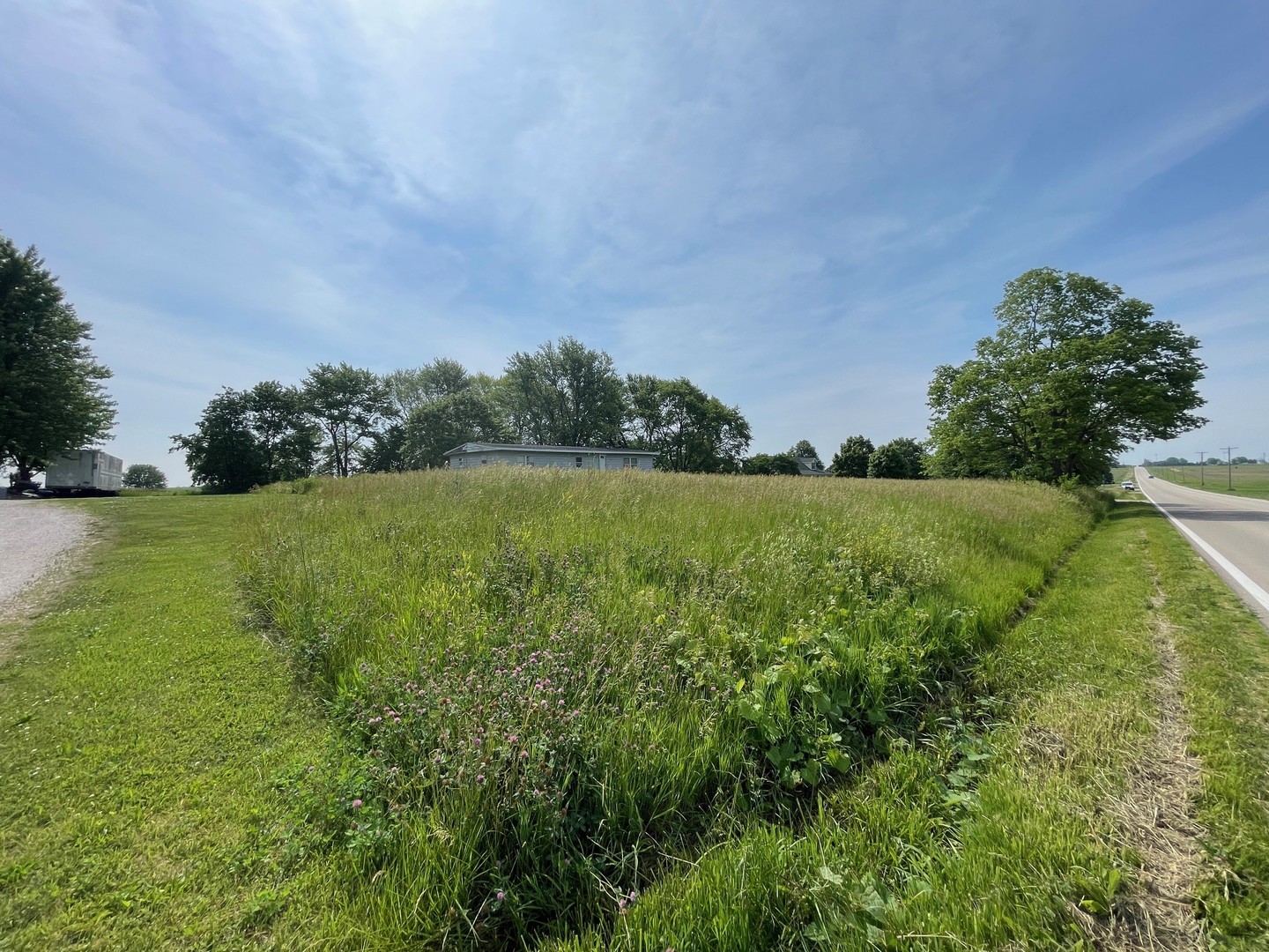 2912 East 29th Road Seneca, IL 61360 - Photo 2 of 5 a view of a field with an ocean