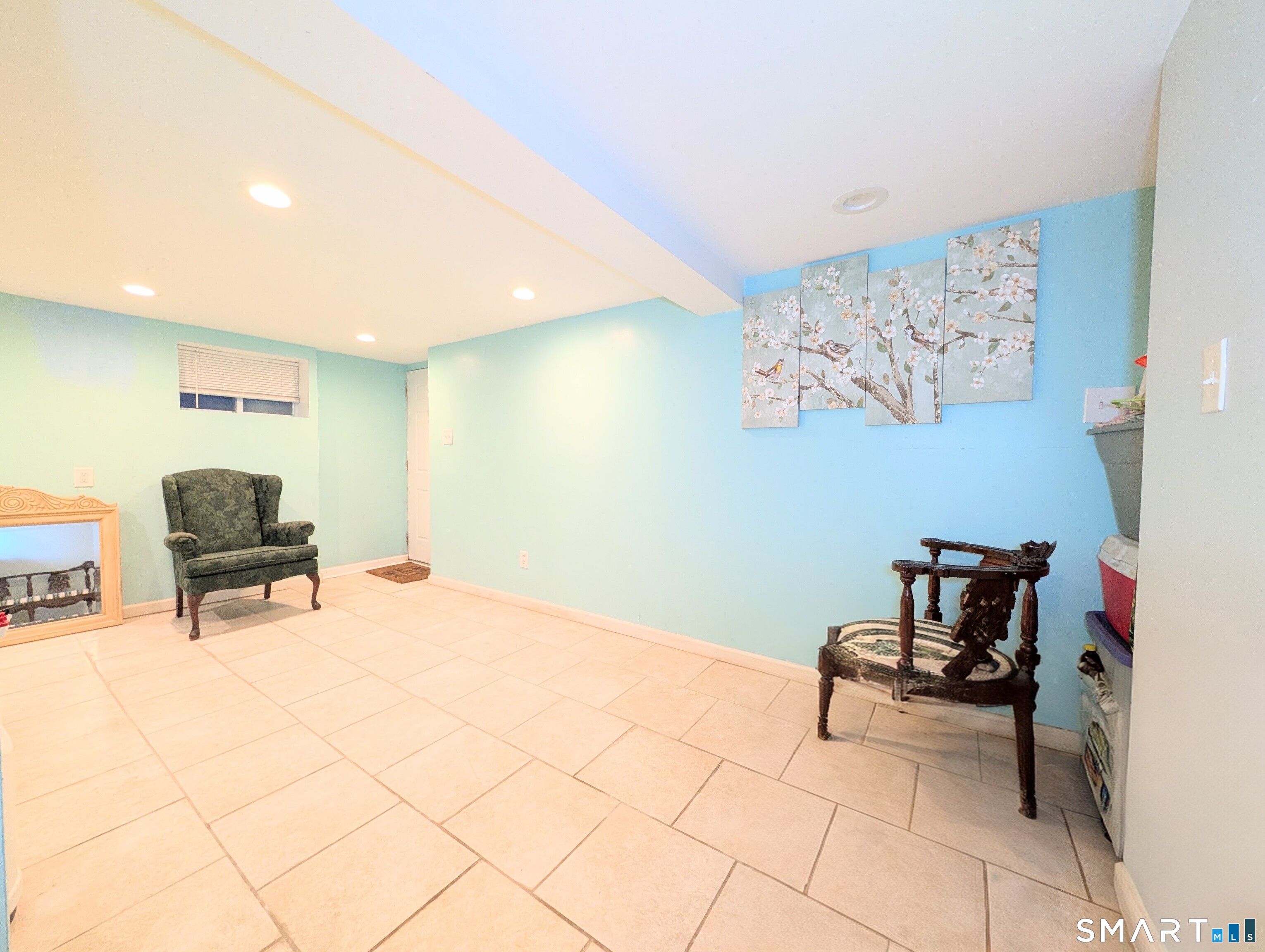 454 Pembroke Street Bridgeport, CT 06608 - Photo 28 of 40 a living room with furniture and a work place