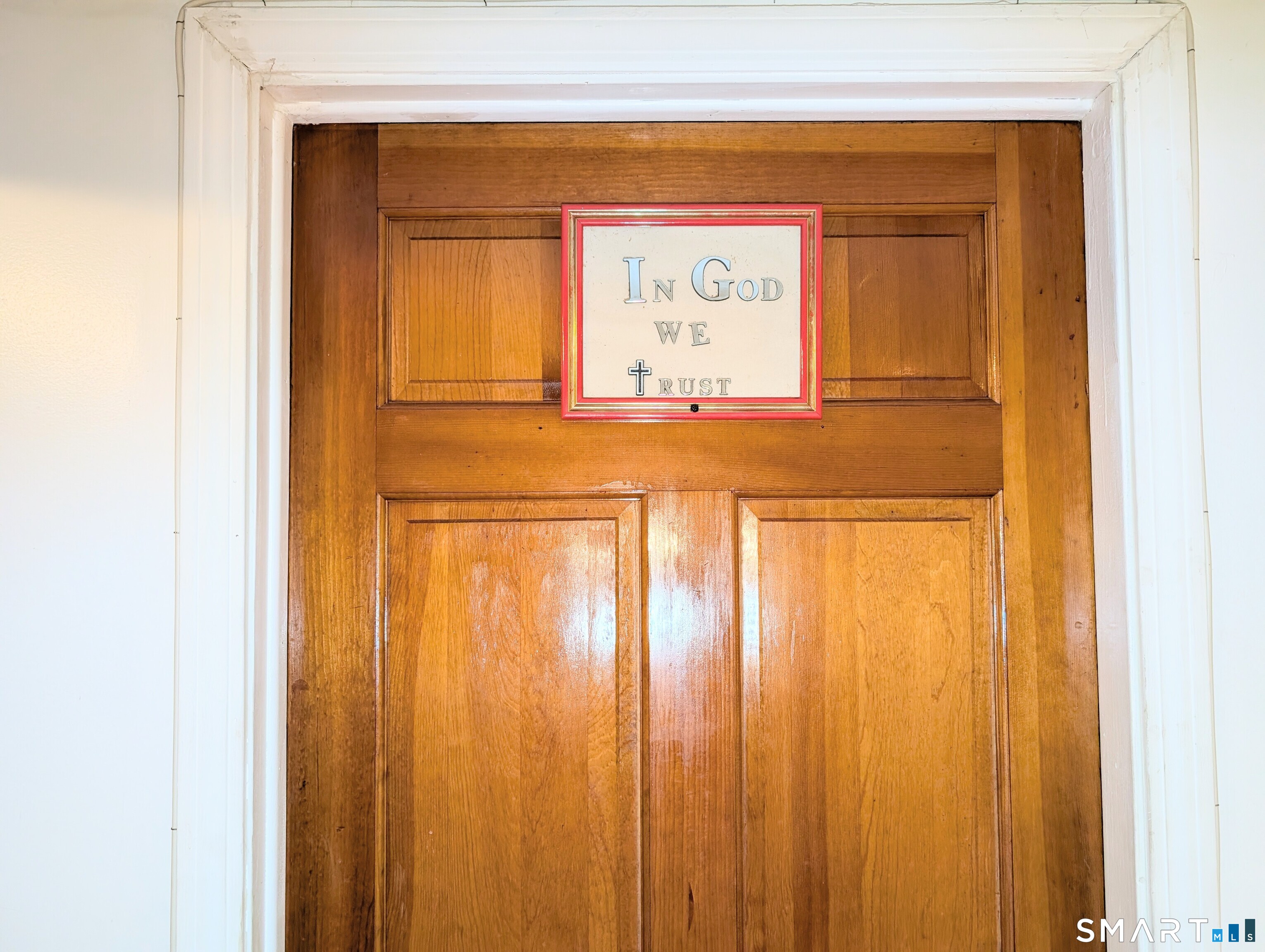 454 Pembroke Street Bridgeport, CT 06608 - Photo 33 of 40 a bathroom with a window and a mirror