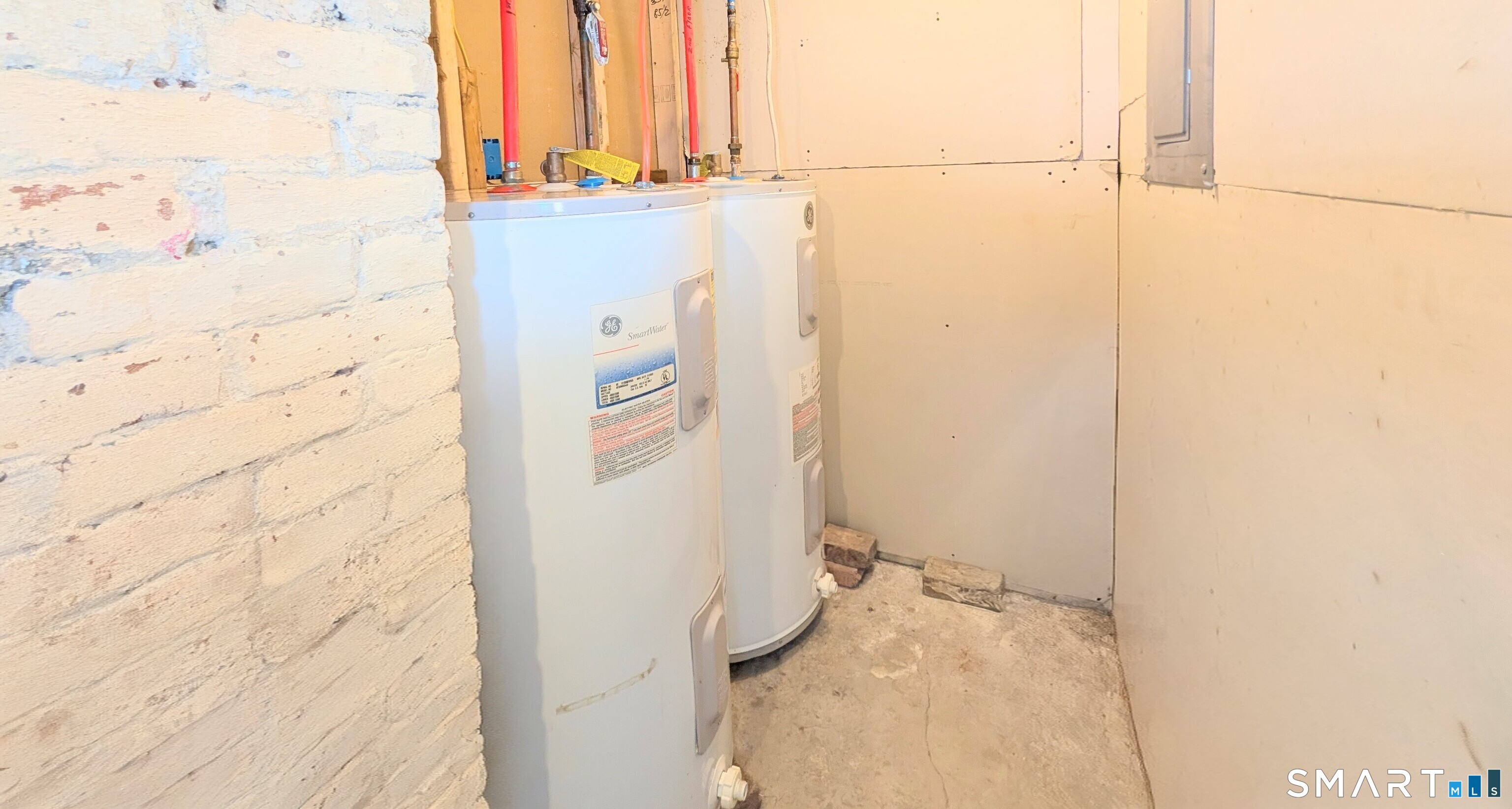 454 Pembroke Street Bridgeport, CT 06608 - Photo 36 of 40 a bathroom with a granite countertop shower and a sink