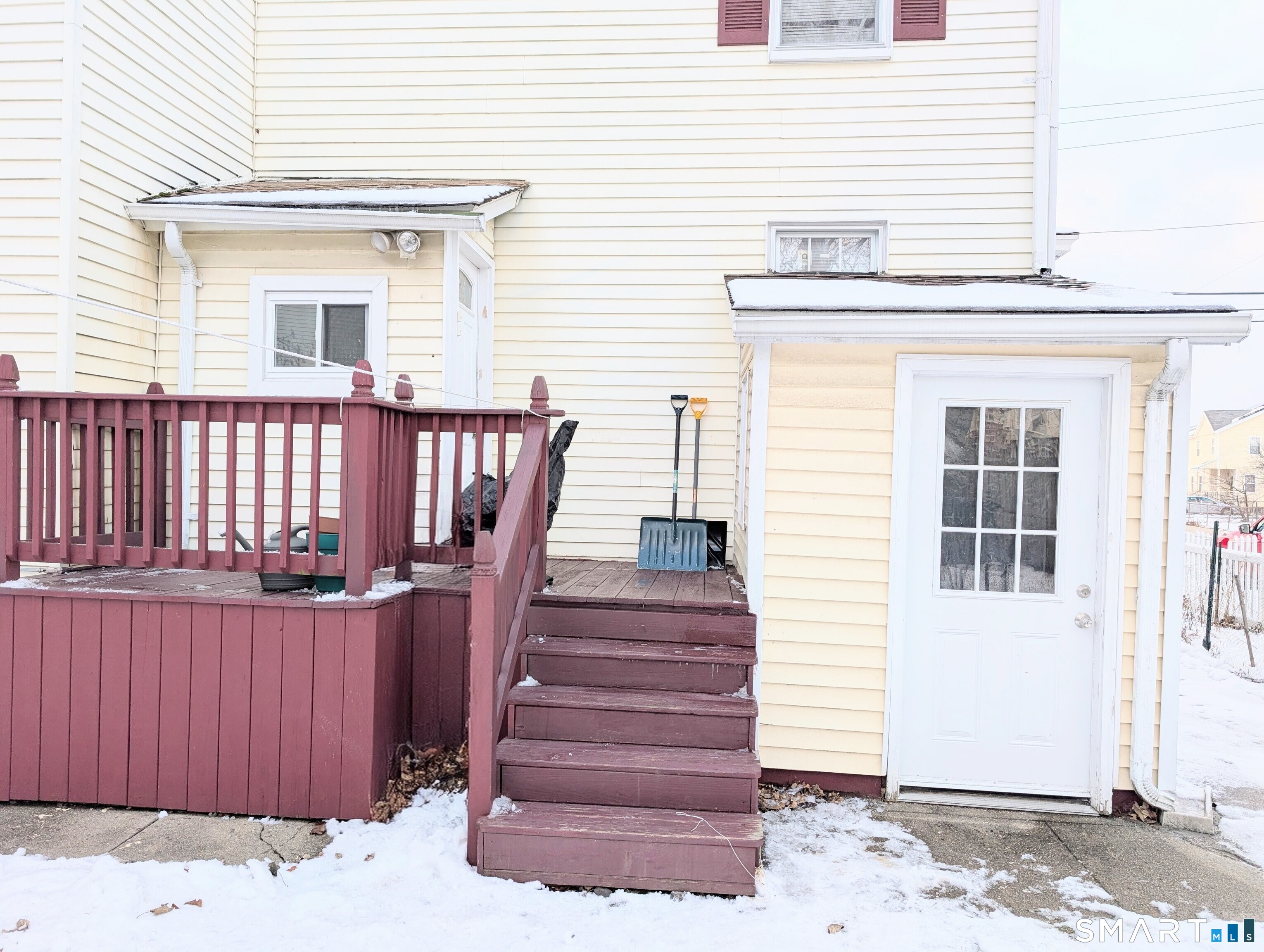 454 Pembroke Street Bridgeport, CT 06608 - Photo 37 of 40 a view of entryway with wooden stairs