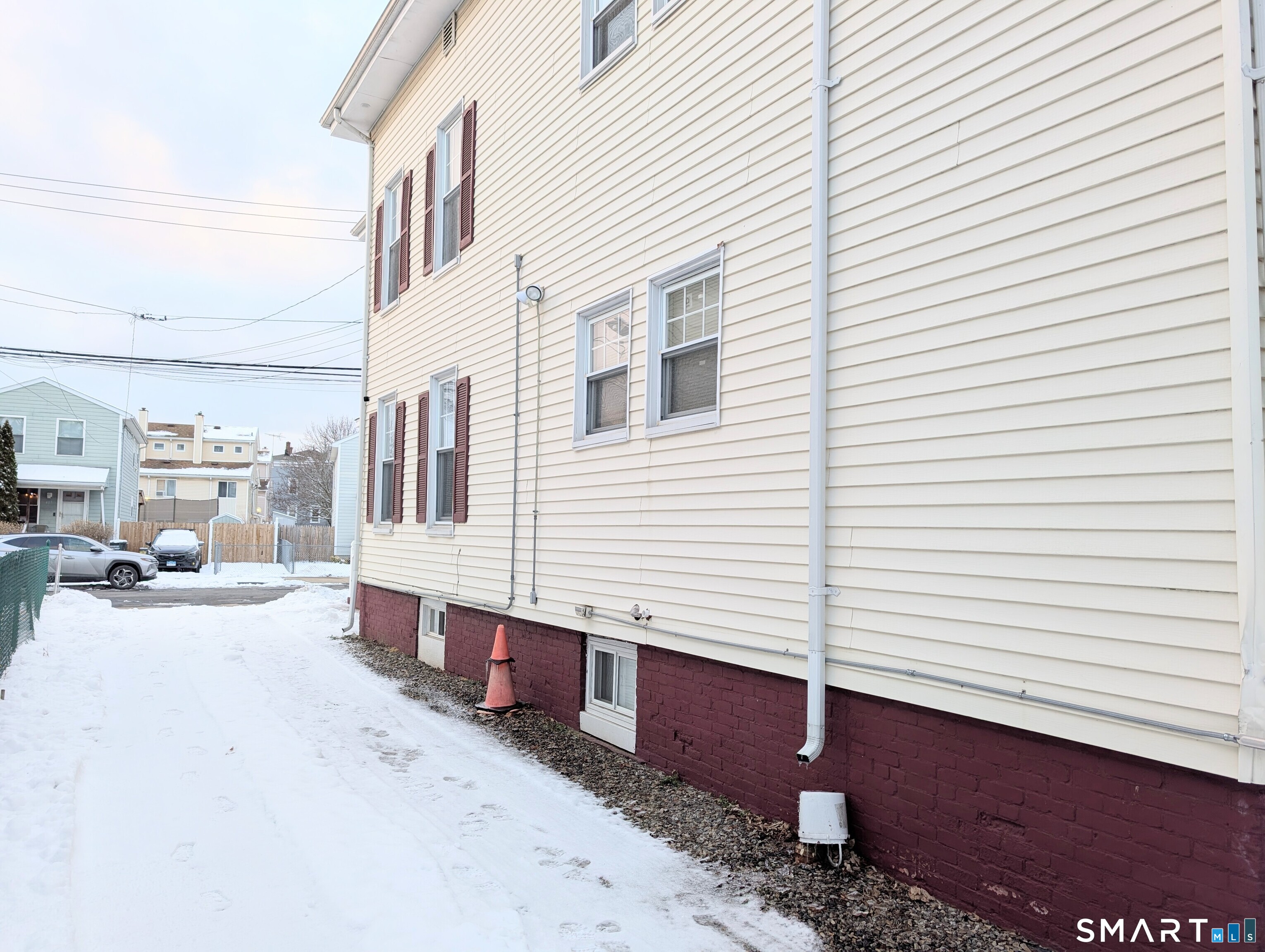 454 Pembroke Street Bridgeport, CT 06608 - Photo 38 of 40 a view of a back yard of the house
