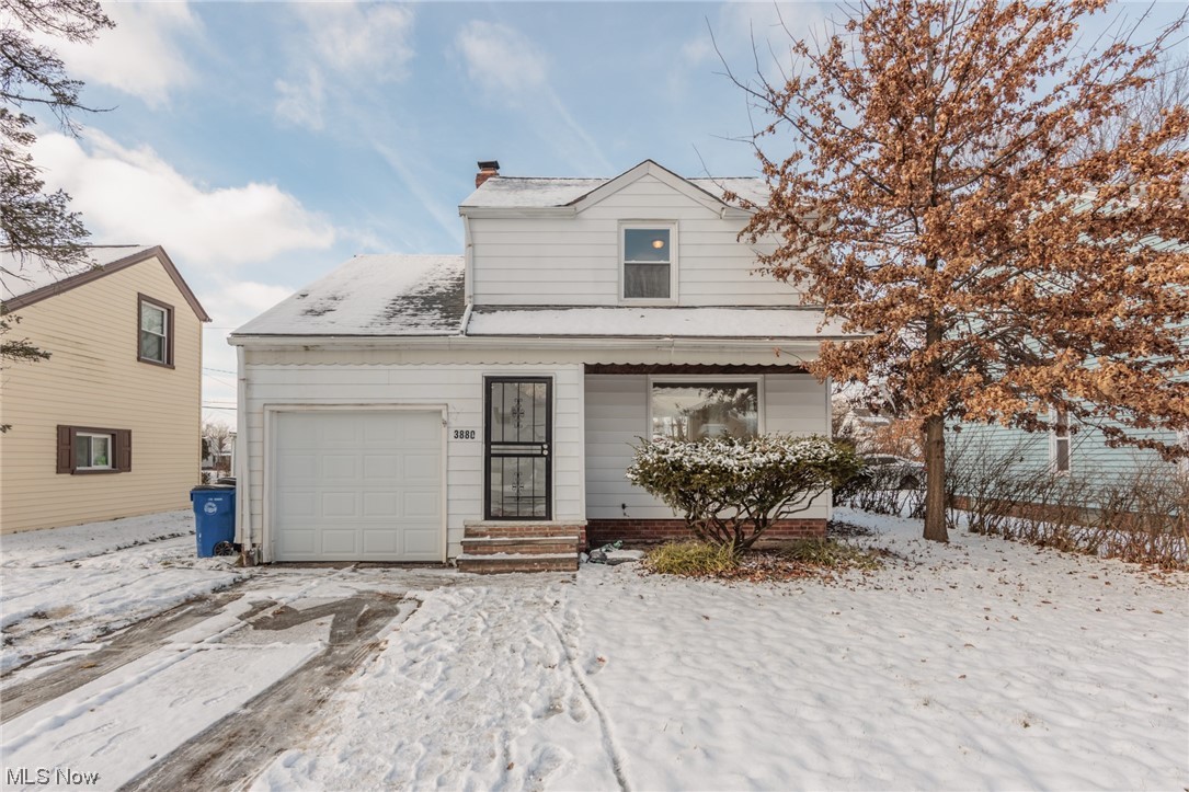 3880 Strandhill Road Cleveland, OH 44128 - Photo 1 of 33 View of front facade with a garage
