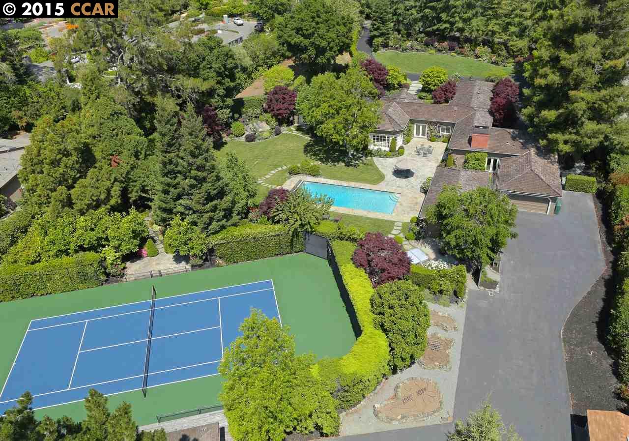 3915 Happy Valley Road Lafayette, CA 94549 - Photo 1 of 1 an aerial view of a house with a yard and lake view