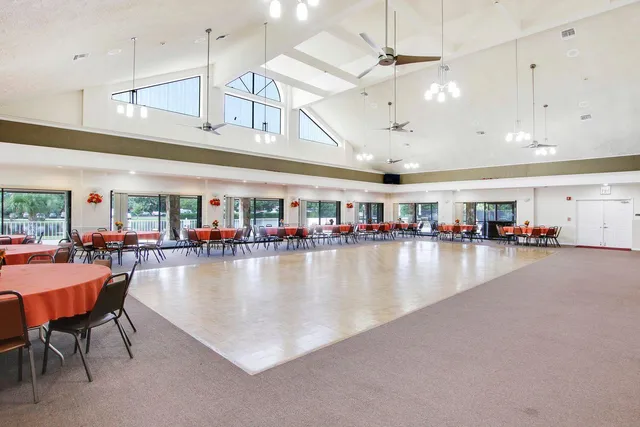a view of a chairs and table in patio