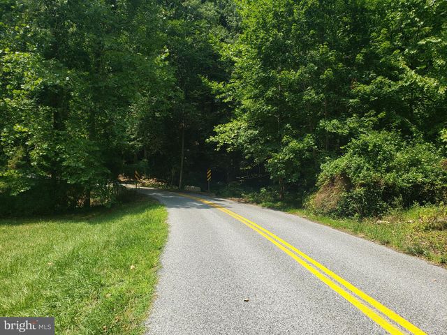 a view of a lake with a park