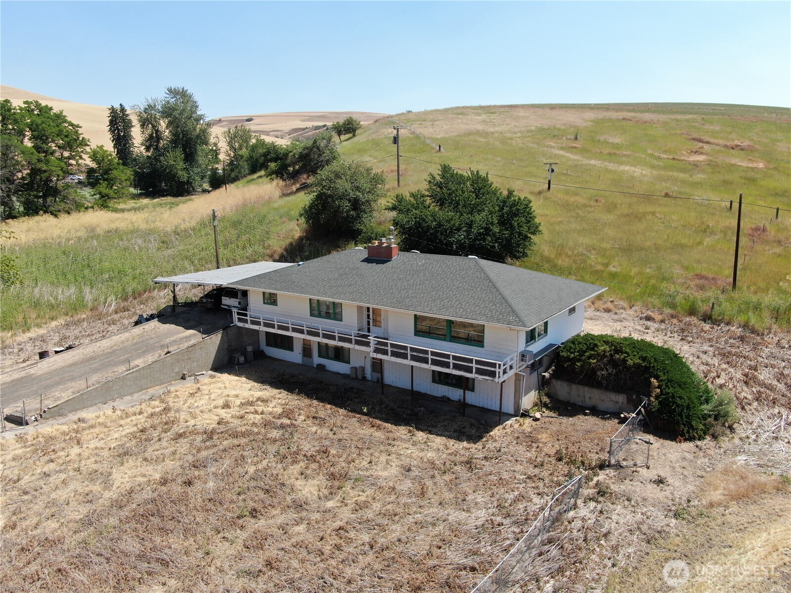5 Niebel Grade Road Pomeroy, WA 99347 - Photo 1 of 34 a view of a house with a yard and mountain view in back