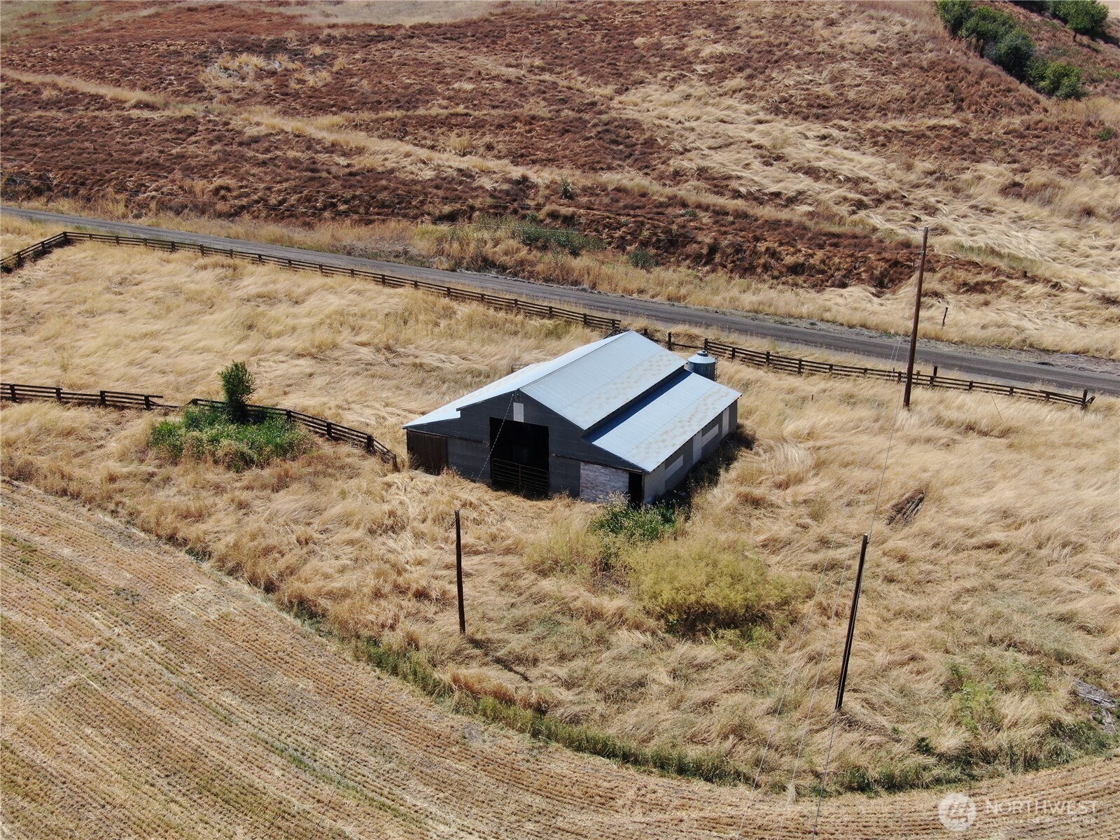 5 Niebel Grade Road Pomeroy, WA 99347 - Photo 5 of 34 a view of a dry yard with wooden fence