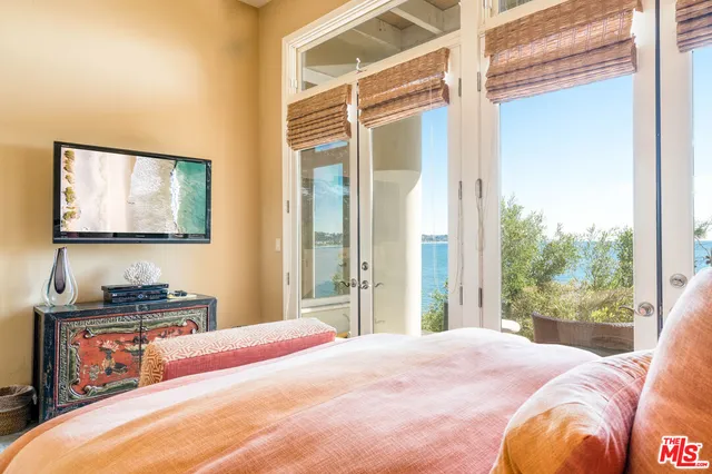 a blue outdoor space with sitting space