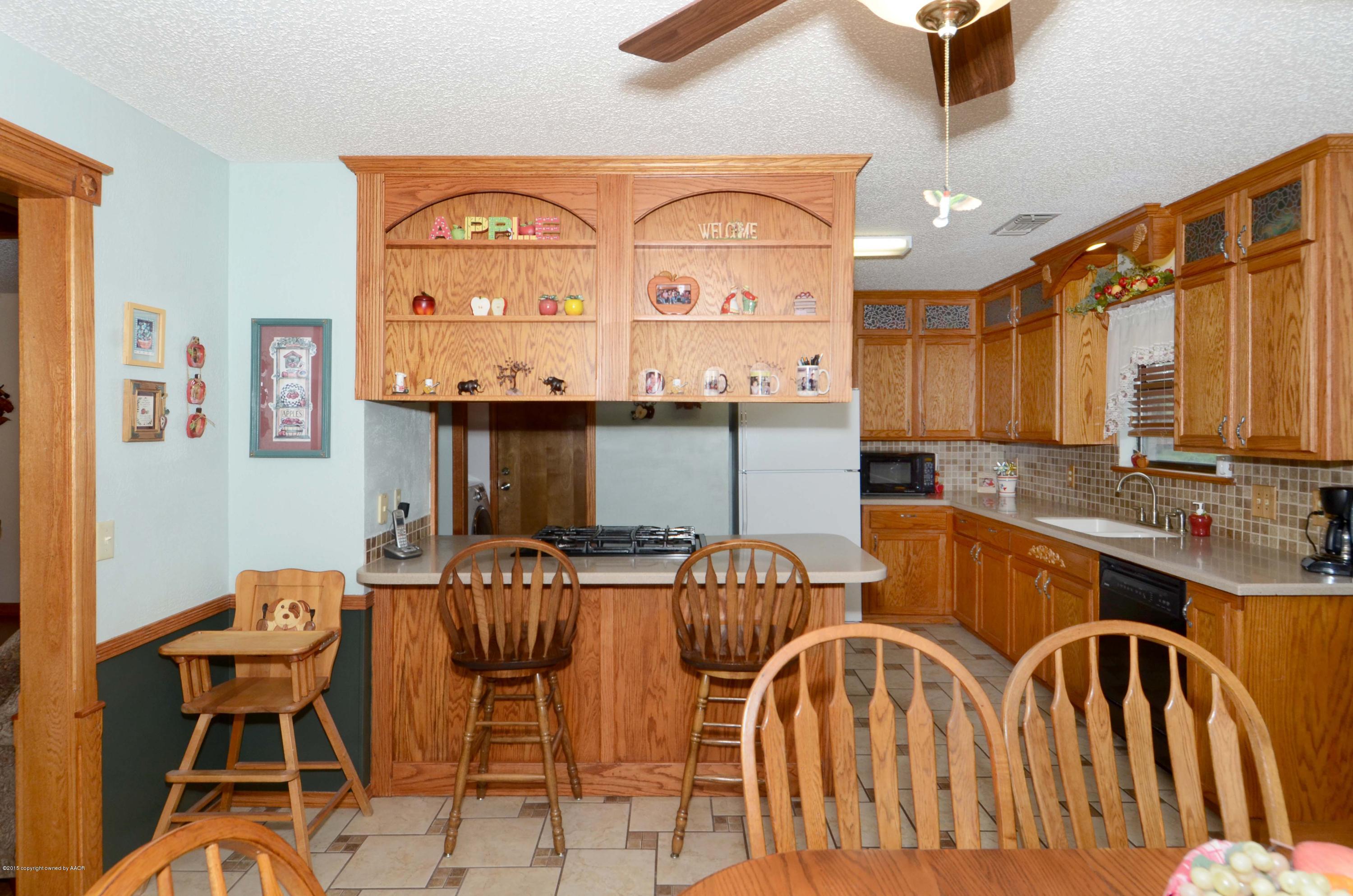 8104 Leah Trail Amarillo, TX 79110 - Photo 4 of 22 a very nice looking kitchen with a large window